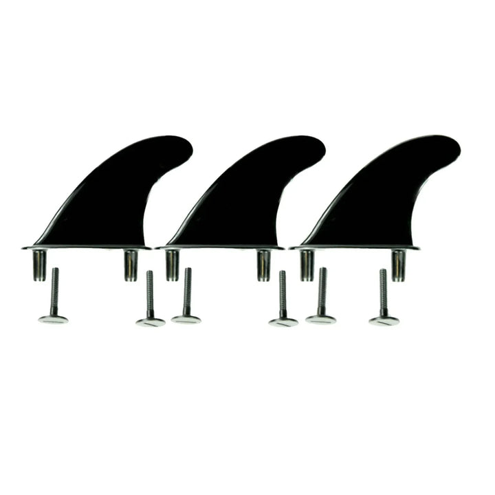 Three black replacement softboard fins on a white background
